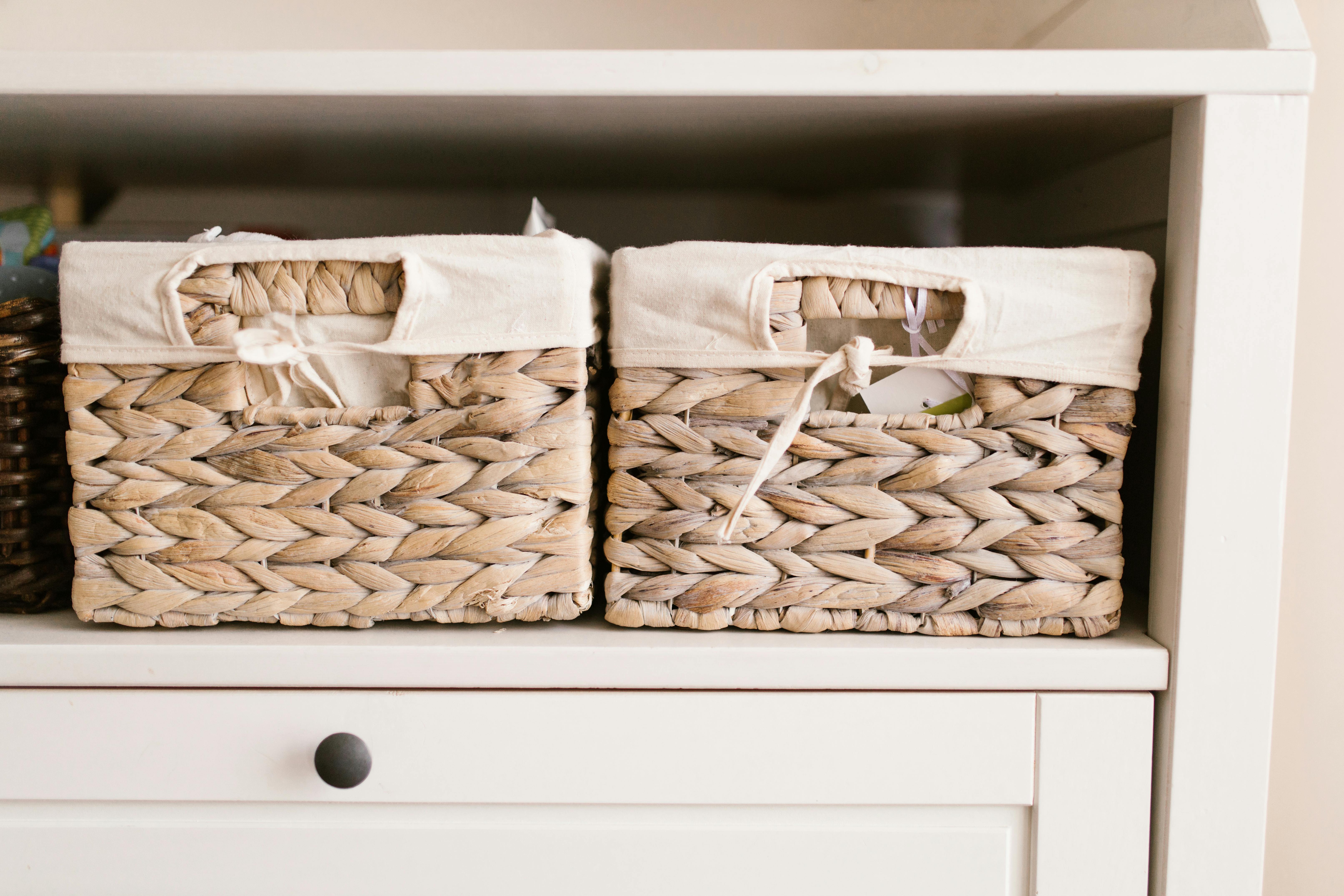 Storage baskets on a shelf ready for packing Easter decorations after cleanup