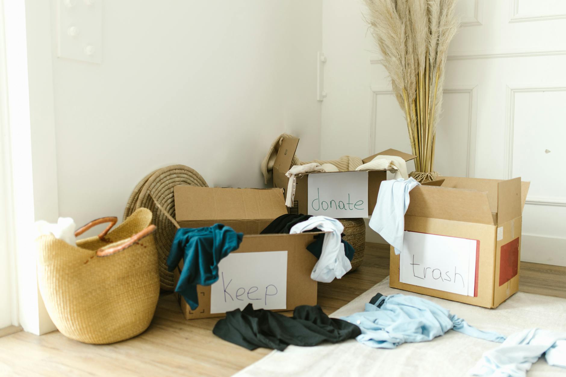 Keep donate and discard boxes used for decluttering before moving house