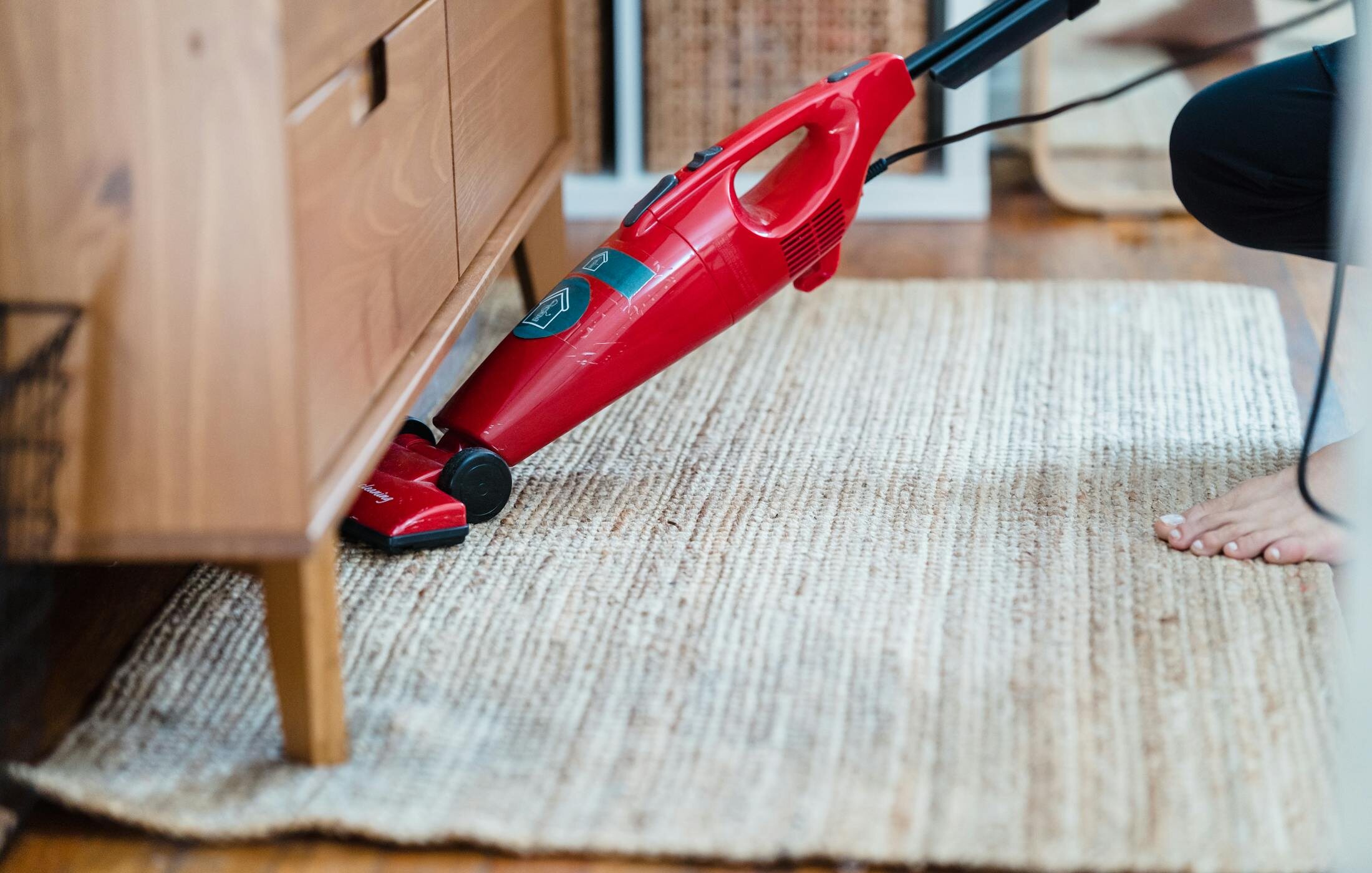 HEPA vacuum removing fine renovation dust from a newly installed floor